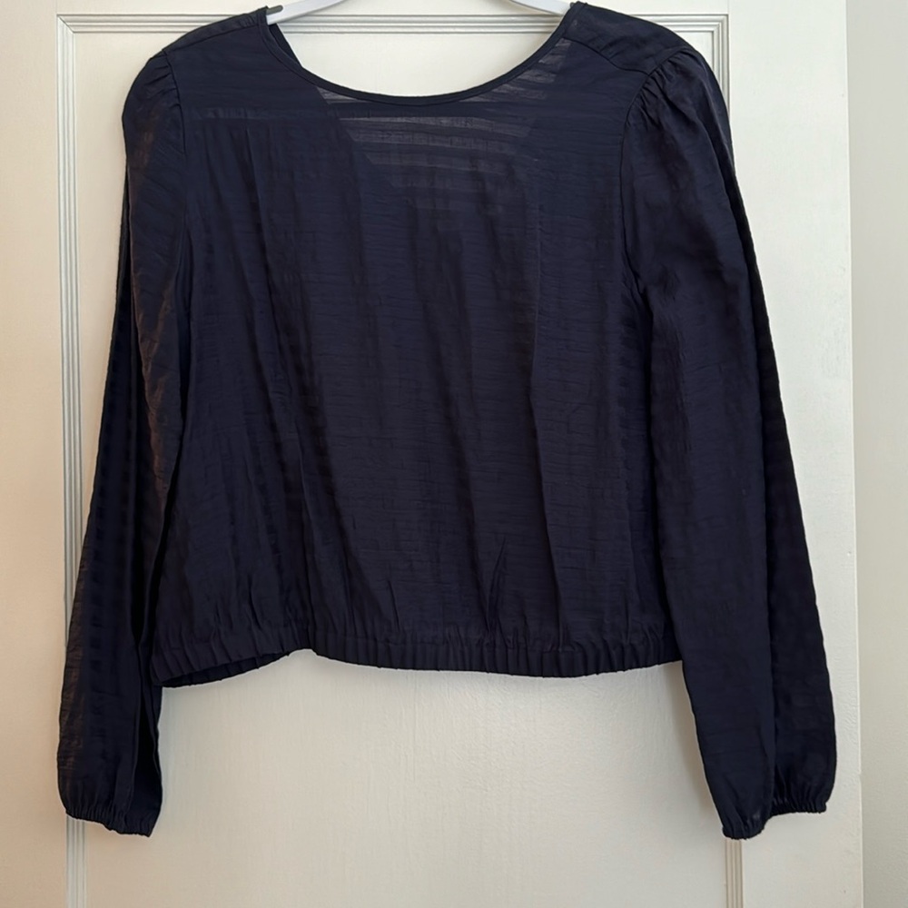 Loft navy lightweight rayon blouse.  Hits at waist, V neck back.